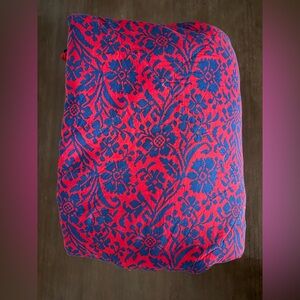 Vintage Coleman Insul 200 sleeping bag with a red and blue floral pattern